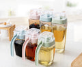 Kitchen Utensils and Glass Spice Bottle Set